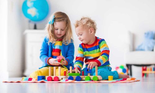 Children-playing-with-wooden-train